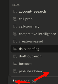 Typing "/" in a Cowork task to bring up the Skills and plugins menu.