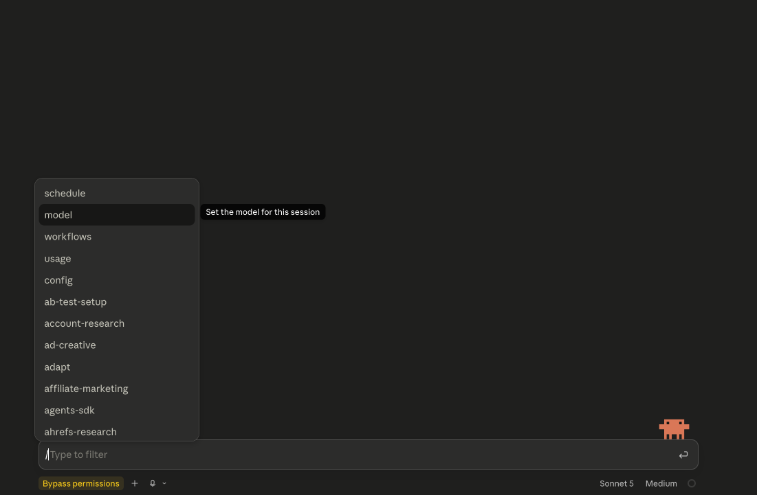 The Claude Code slash command menu, opened by typing a forward slash, showing commands like model, usage, config and workflows.